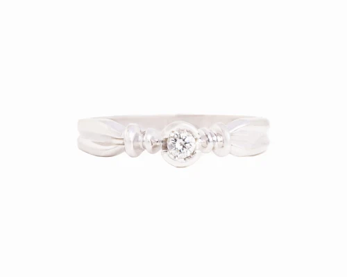 Pierścionek z diamentem ok. 0, 10 ct w białym złocie