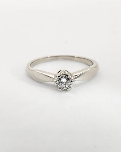 Pierścionek z diamentem o masie ok. 0,14 ct , zaręczynowy